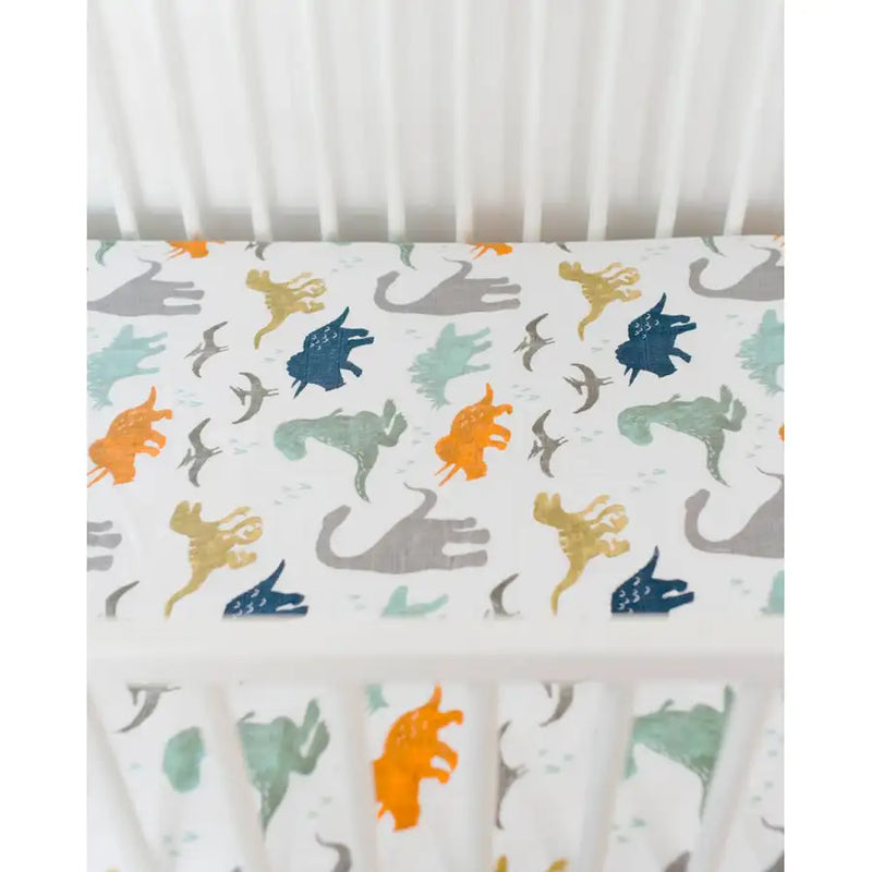 Little Unicorn Cotton Muslin Cot Sheet - Dino Friends - Babyonline