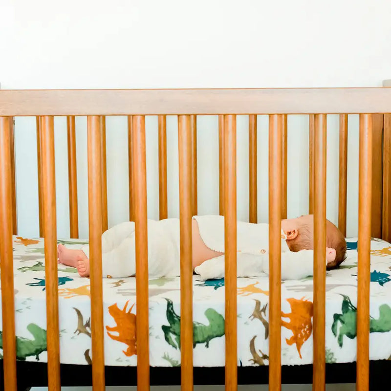Little Unicorn Cotton Muslin Cot Sheet - Dino Friends - Babyonline